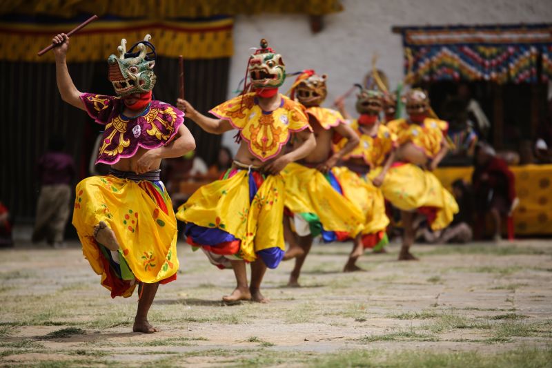 Masked dancers at a Bhutan tshechu (festival)