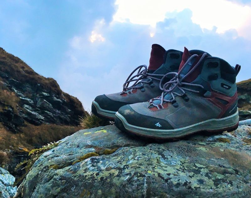 Trekking boots on a rock