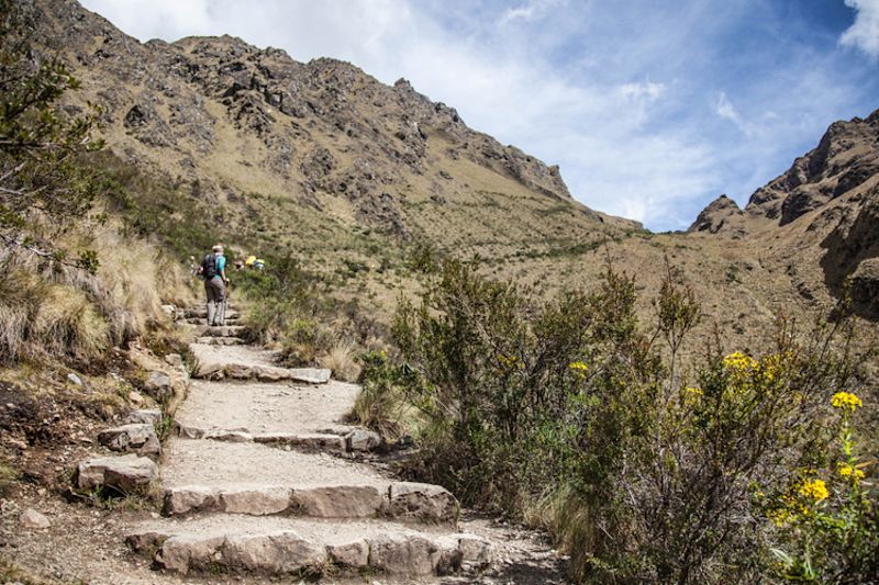 Trekkers on approach to Dead Woman's Pass on Inca Trail in Peru