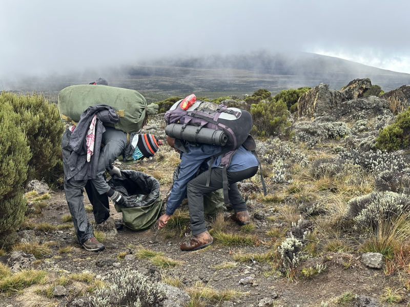 Kilimanjaro crew picking up litter November 2023