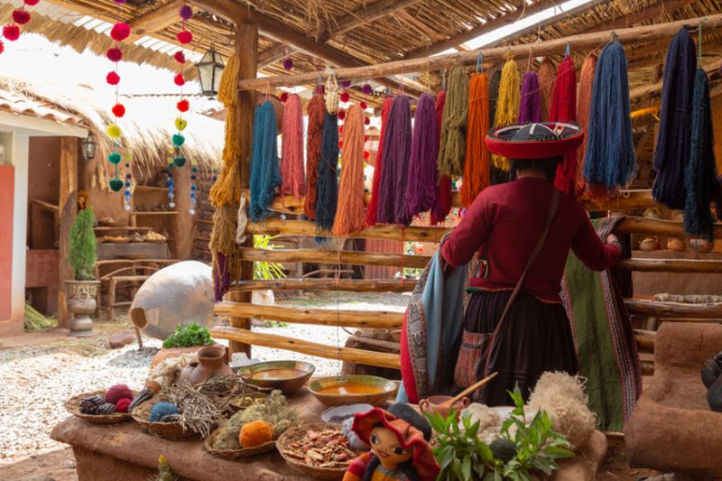 Chinchero, Cusco, Peru. December 2018, Process of natural dyeing of alpaca and llama wool, Quechua woman. 