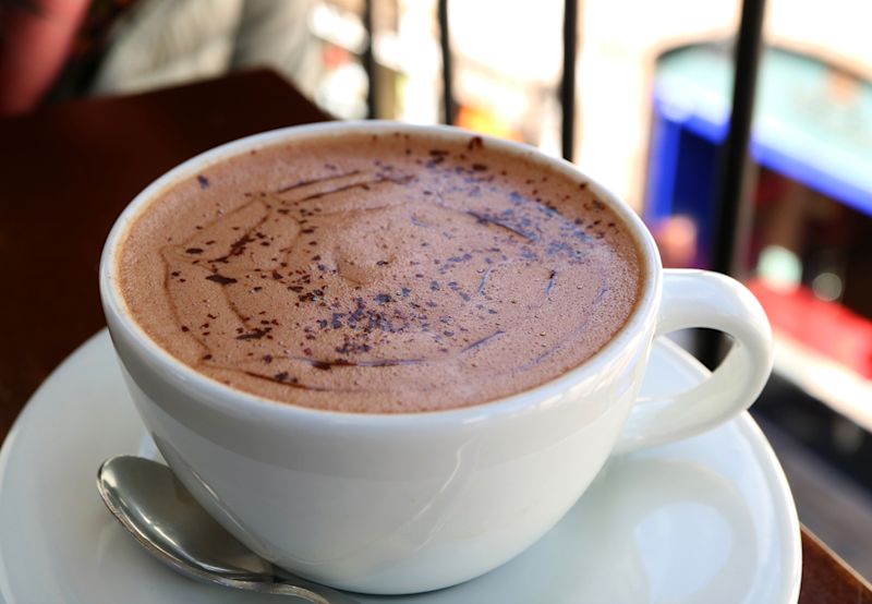 Cup of hot chocolate at the upper floor terrace, Cusco, Peru