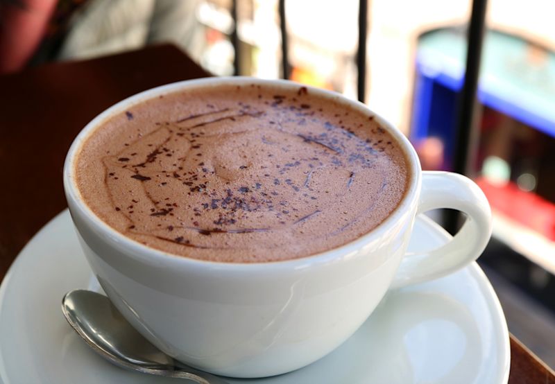  Cup of hot chocolate at the upper floor terrace, Cusco, Peru