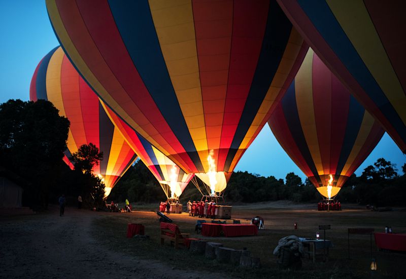 Early dawn and hot air balloons at Little Governors' Camp, Masai Mara National Reserve