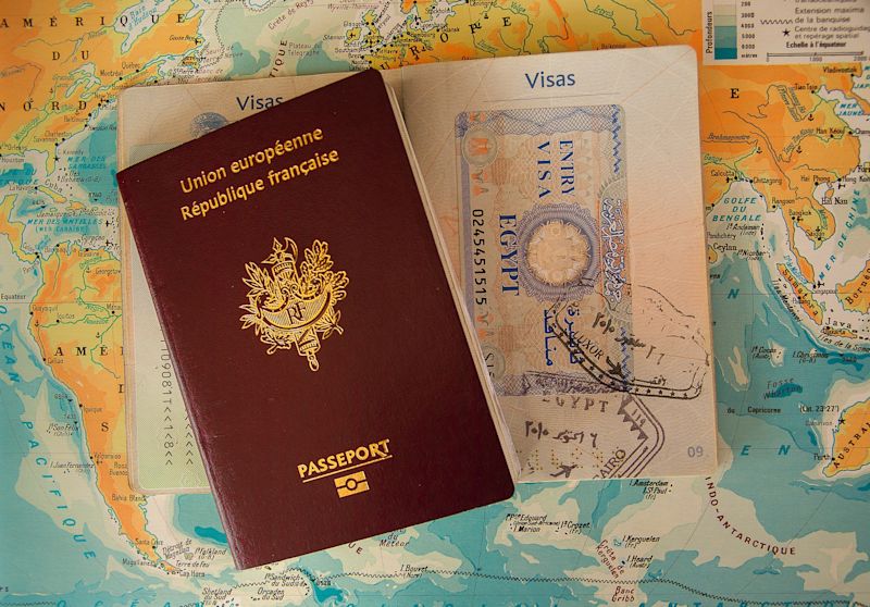 French passport and world map