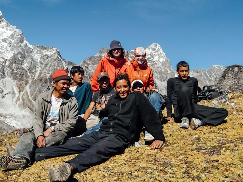 Trekkers smiling on trek route