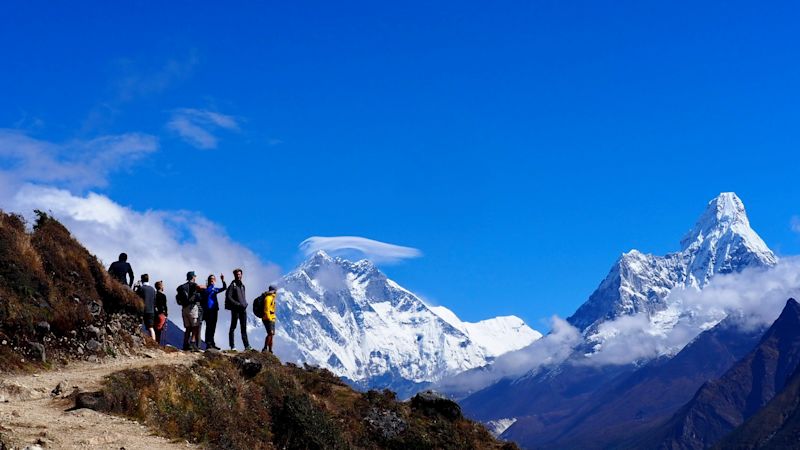 Ours. Dez and Bren group shot EBC trek trail Ama Dablam