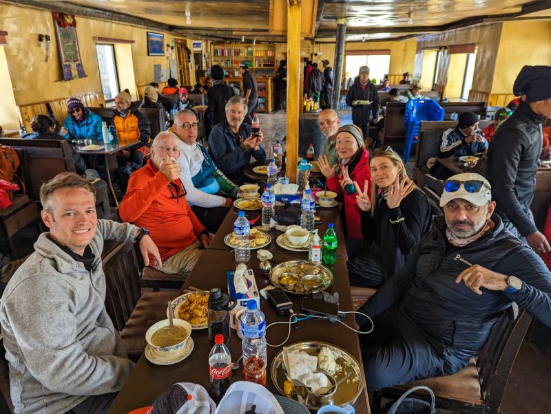 Trekking group photo, teahouse dining or common room, food and meals, soup and drinks, EBC trek, Nepal (1)