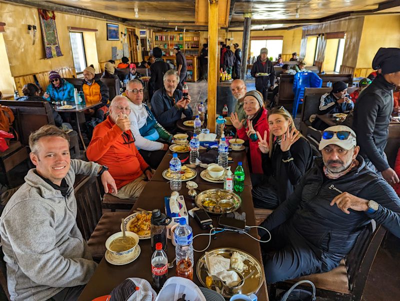 Trekking group photo, teahouse dining or common room, food and meals, soup and drinks, EBC trek, Nepal (1)