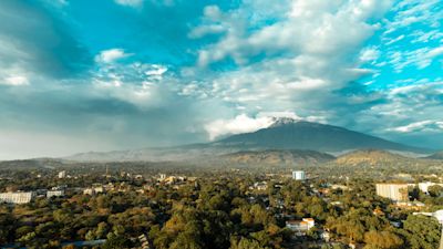 Mt Meru in distance with Arusha in foreground