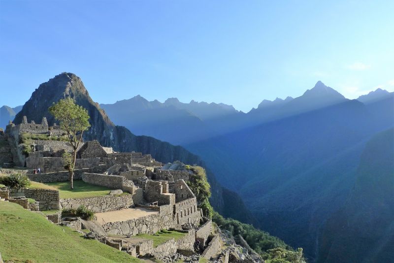 Machu Picchu with low-angled sunlight, clear day