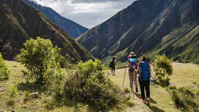 Ours. Trekkers on Inca Trail in valley, Peru