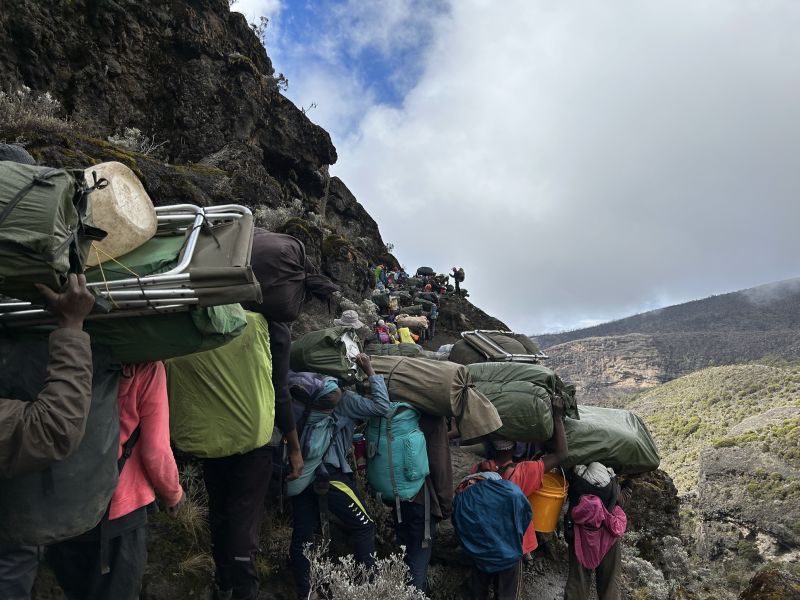 Porters and trekkers on Barranco Wall, Kilimanjaro