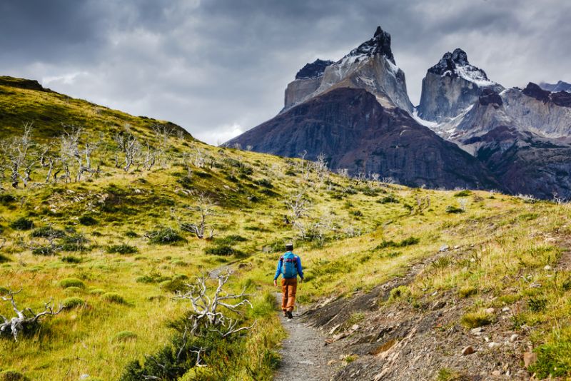 Trekker on path in Torres del Paine National Park, Patagonia, Chile