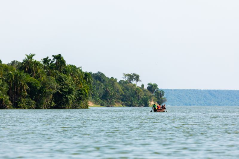 Ours. S. A boat with fishermen on the Kazinga Channel in Queen Elizabeth NP, Uganda