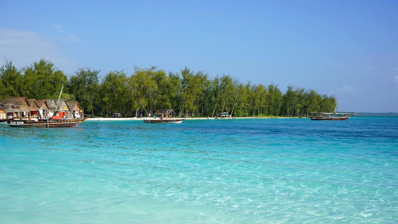 Kendwa beach, Zanzibar. Kendwa is located northwest of Zanzibar Island. It has a long beach of heavenly white sand
