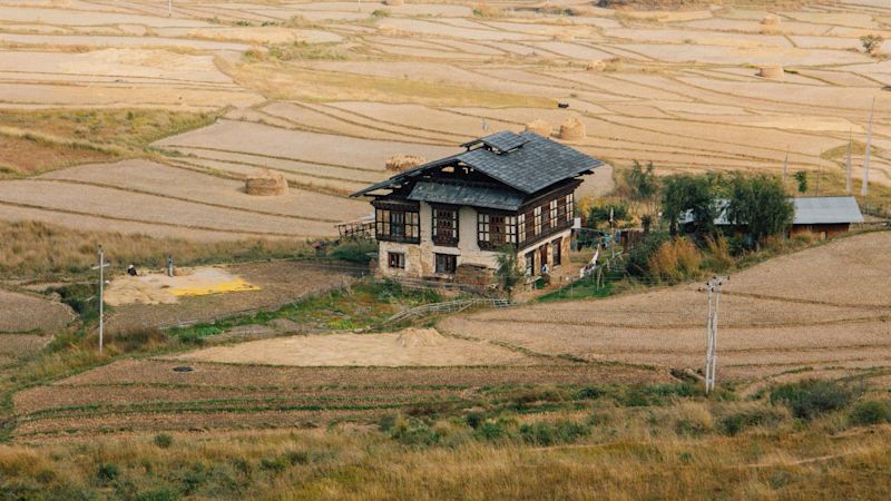 Traditional homestead in Punakha, Bhutan