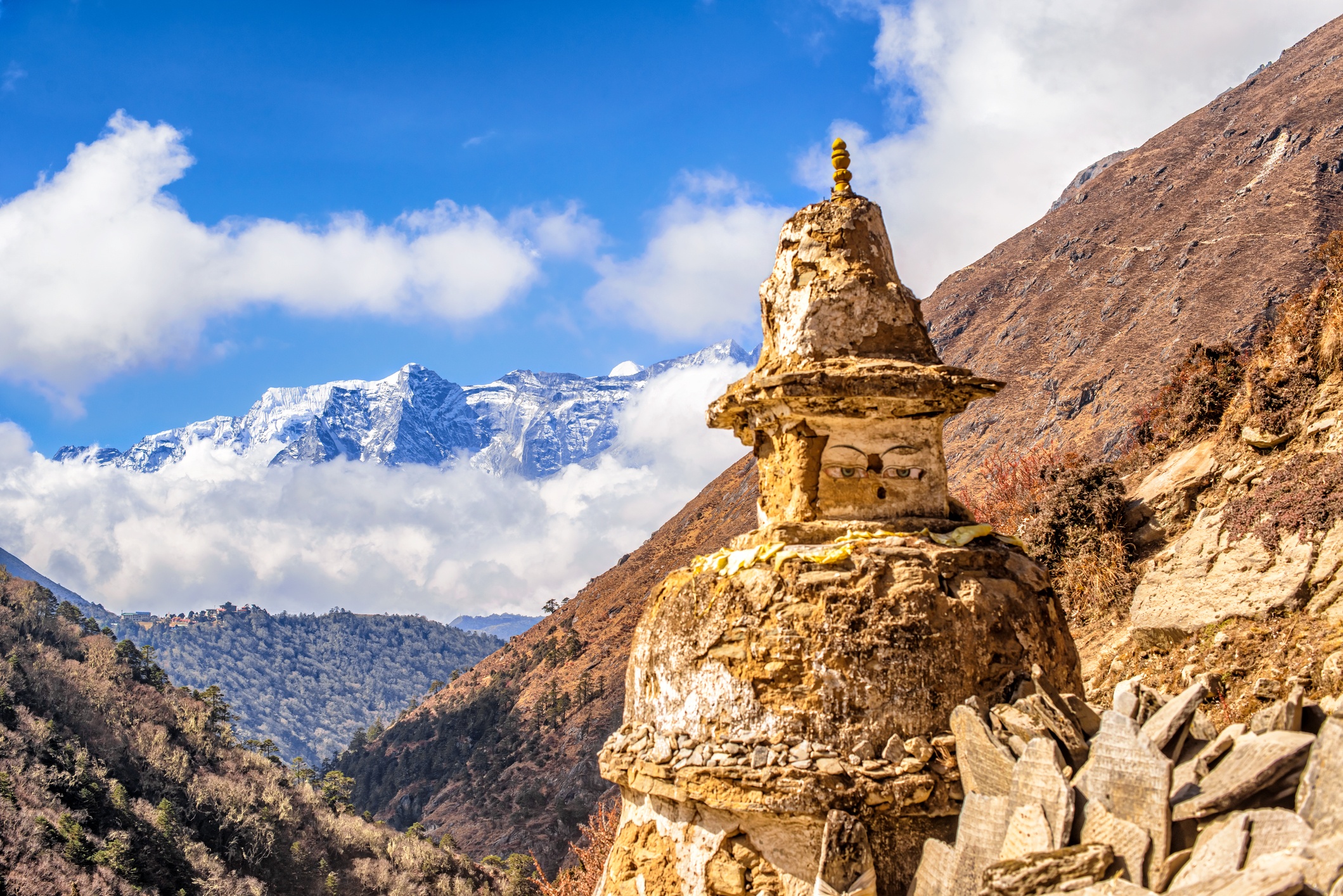Crumbling stupa in Himalayan mountains landscape on the trail between Pheriche and Namche Bazaar in Nepal