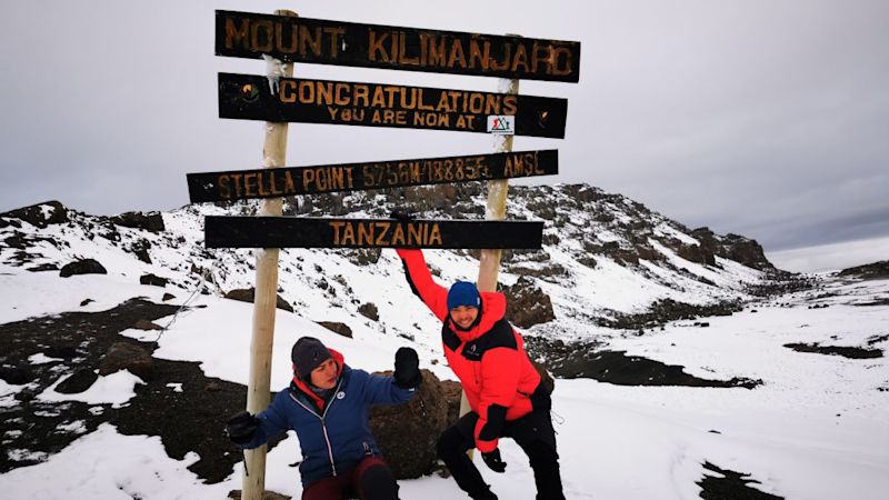 Matthieu and Arwa at Stella Point Kilimanjaro