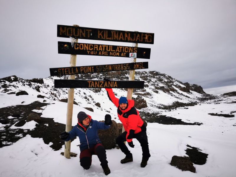 Matthieu and Arwa at Stella Point Kilimanjaro
