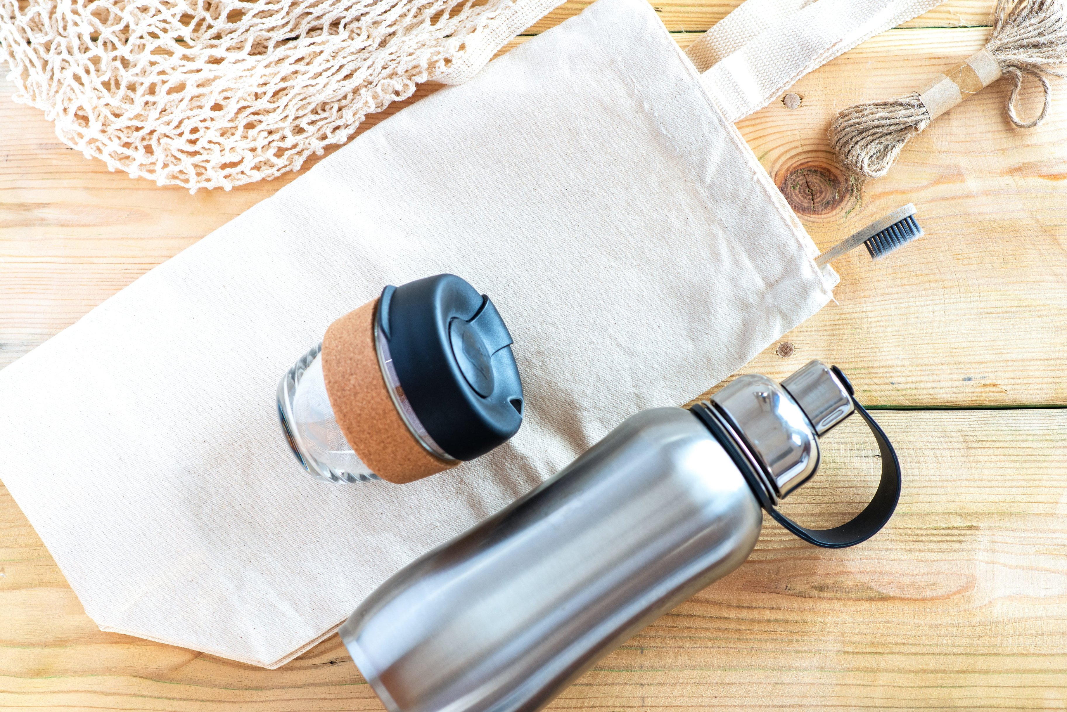 Ours. Reuseable coffee cup and water bottle, ecotourism, eco travel