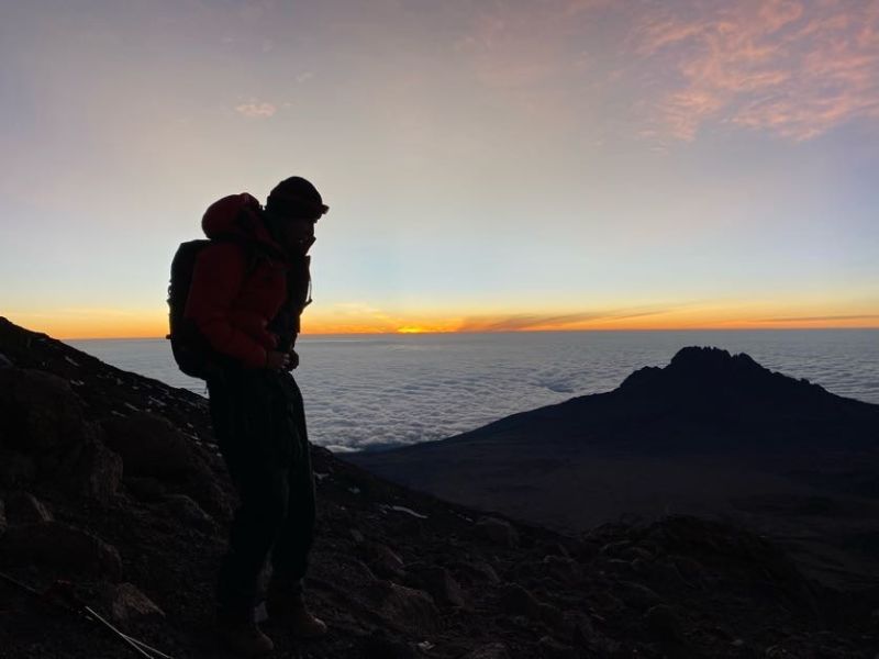 Kilimanjaro climber summit hike sunrise