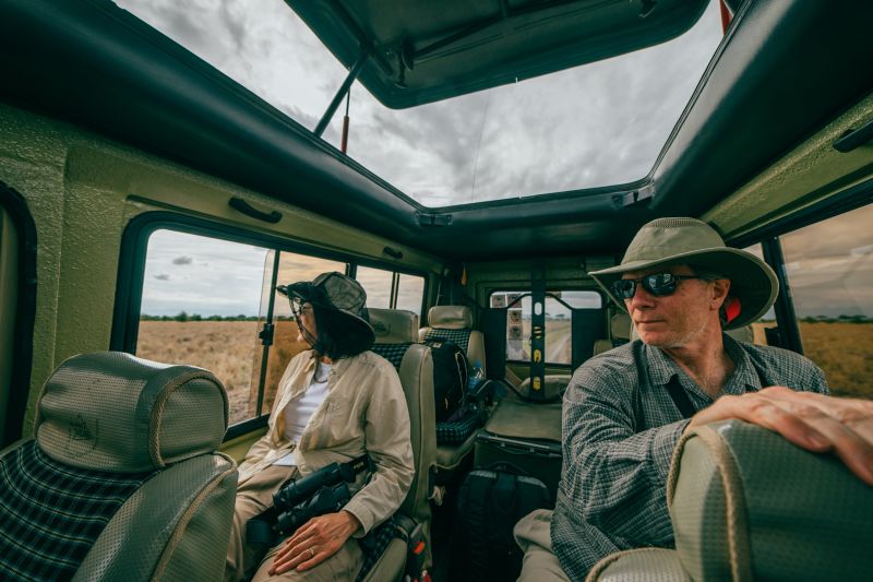 Man and woman in safari vehicle