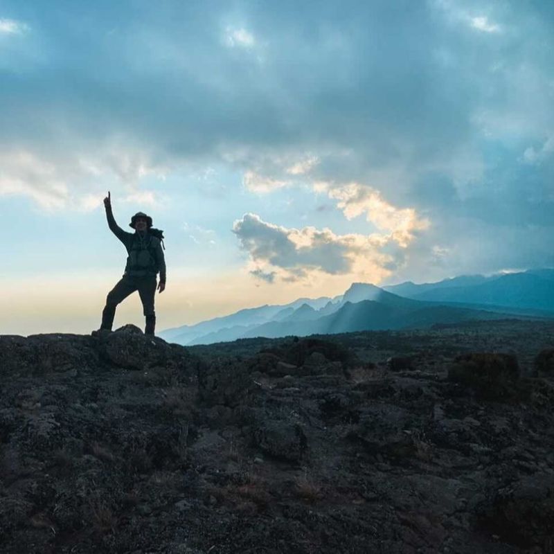 Silhouetted Kilimanjaro climber