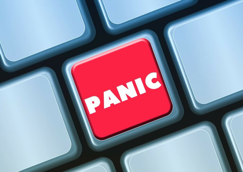 Red panic button on a keyboard