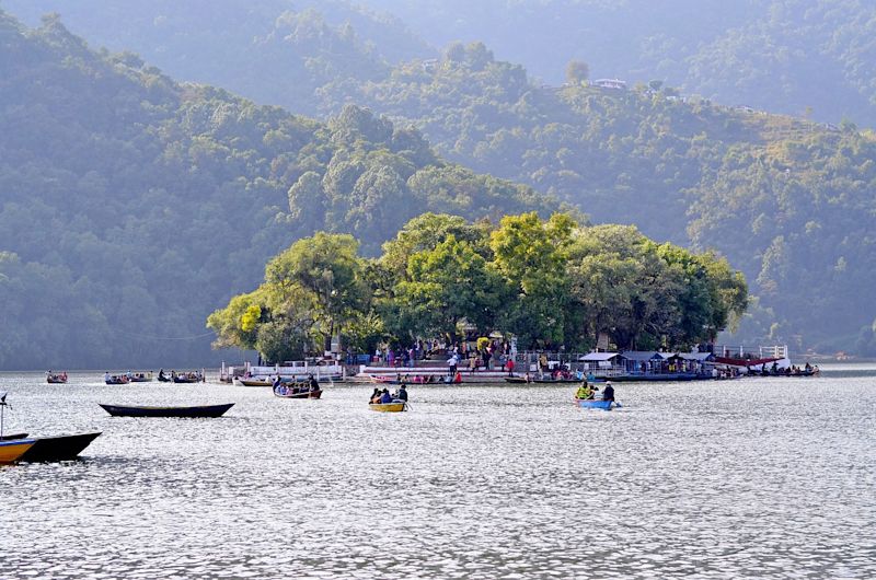Phewa Lake Hindu Temple Pokhara canoes Nepal