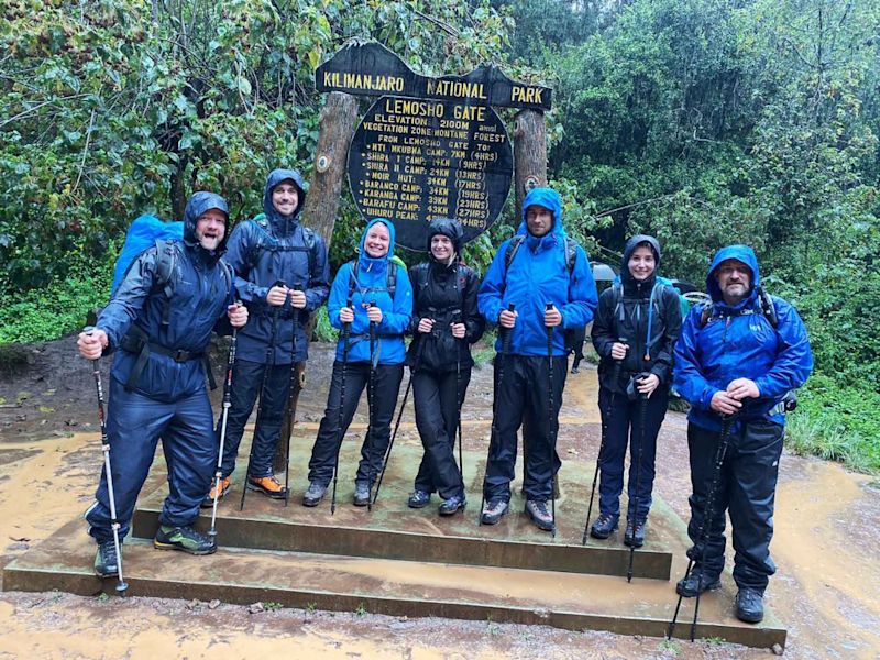 Lemosho Gate Kilimanjaro group photo rain