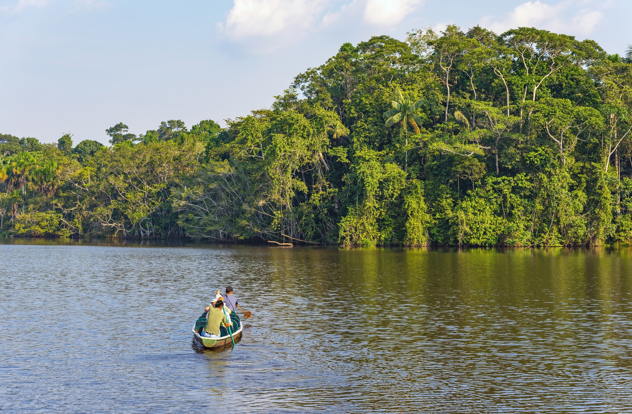 canoe on river in amazon