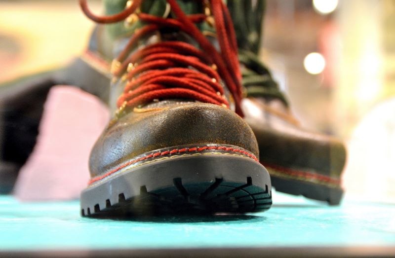 Close up of hiking boots with red laces in store
