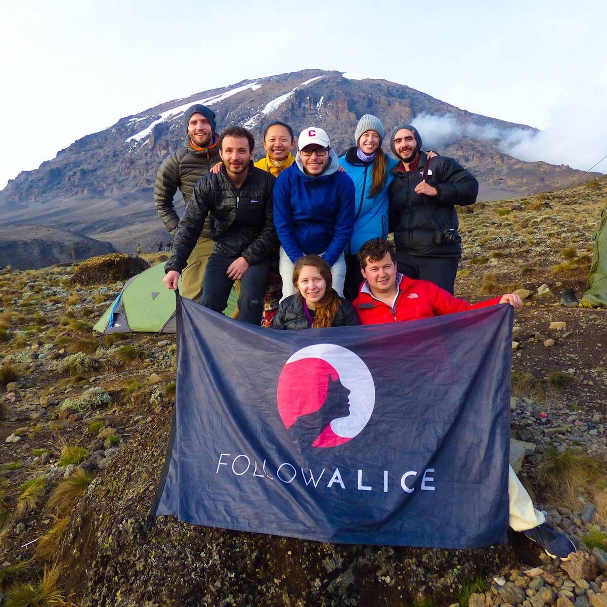 Kilimanjaro group with Follow Alice flag