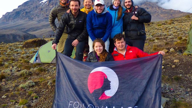 Kilimanjaro group with Follow Alice flag