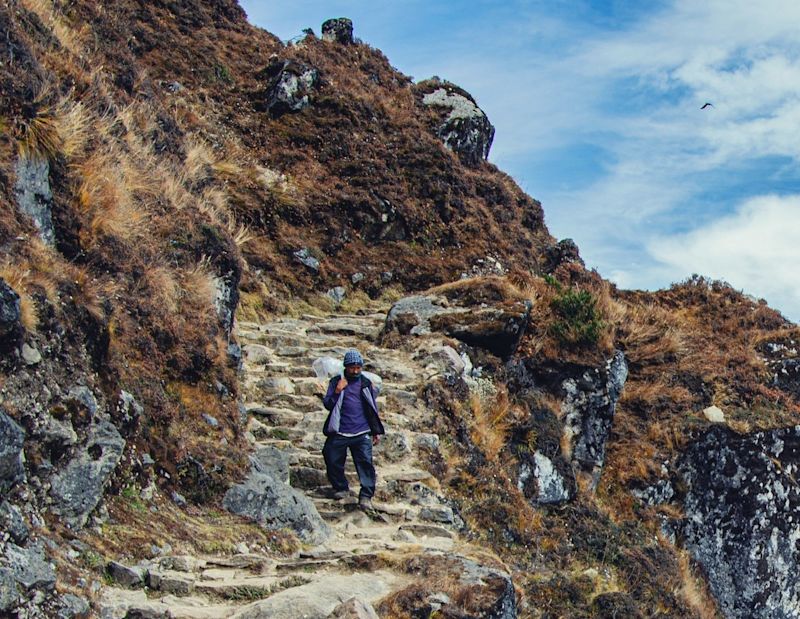 Sherpa on trail on EBC trek, Nepal