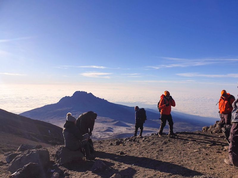 Trekkers at the top of Kilimanjaro, Kilimanjaro safety