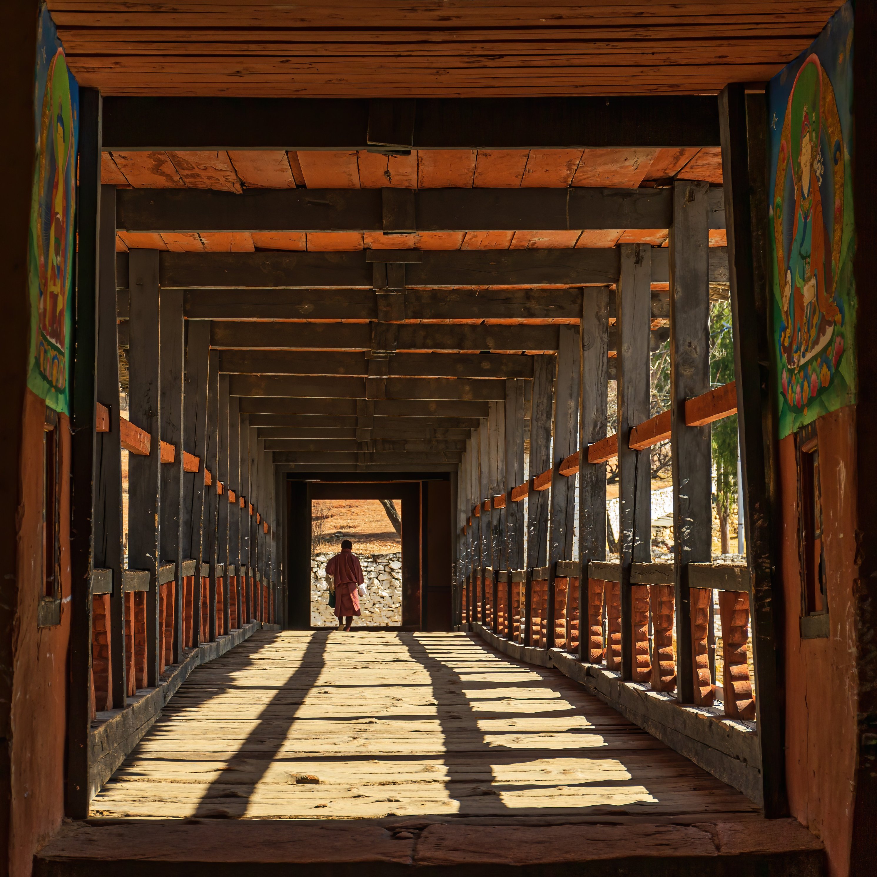 Monk walking towards Dzong, Paro, Bhutan
