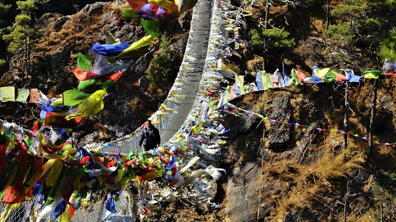 Prayer flags on Tenzing-Hilary bridge en route to NAmche Bazaar on EBC trek, Nepal