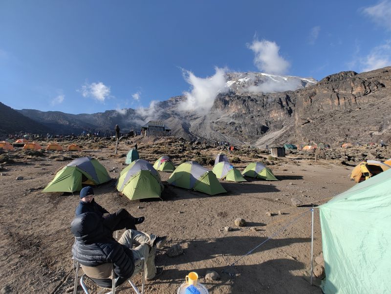 Climbers sitting in Barranco Camp on Kilimanjaro