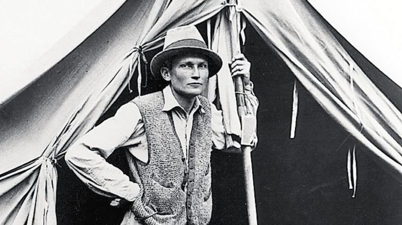 Hiram Bingham by tent in Peru, 1912