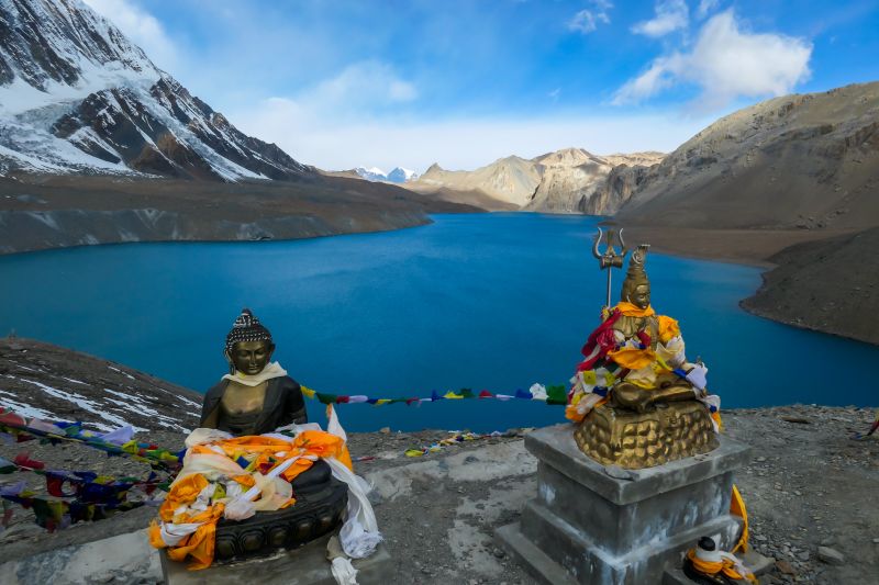 Pur. Buddha statues Tilicho lake, Annapurna, Nepal