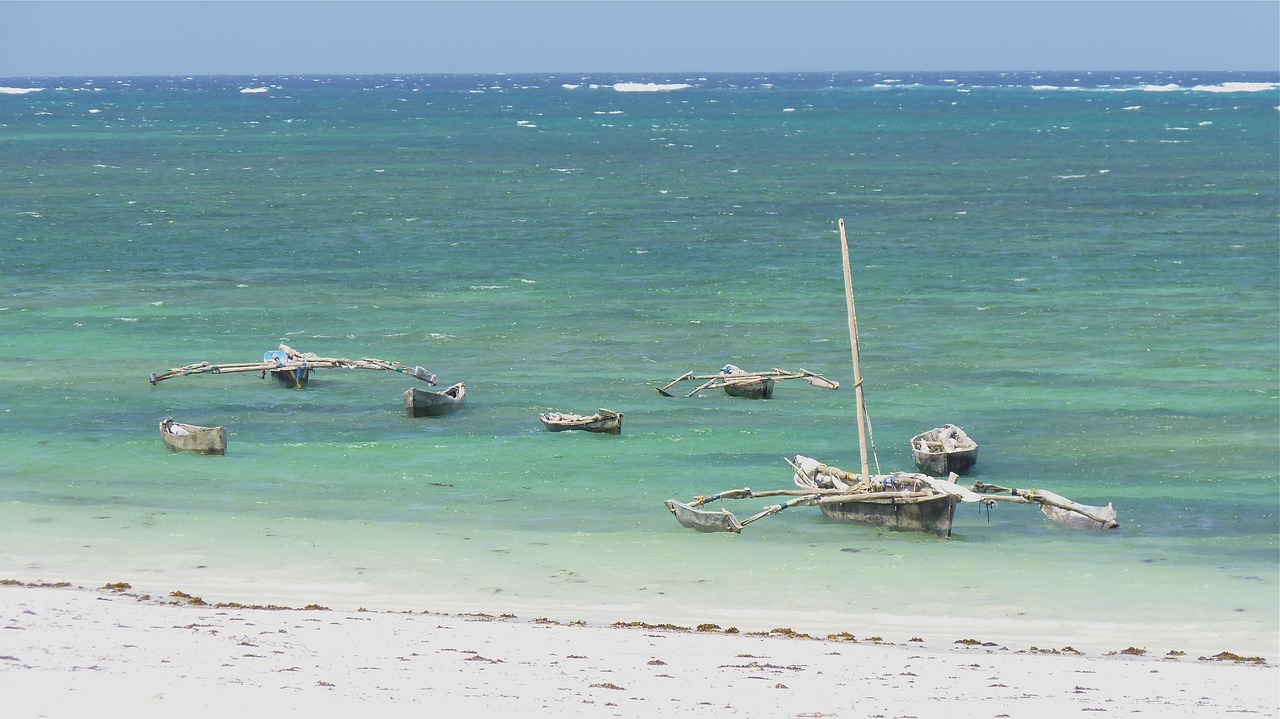 Boats in water on Diani Beach, Kenya