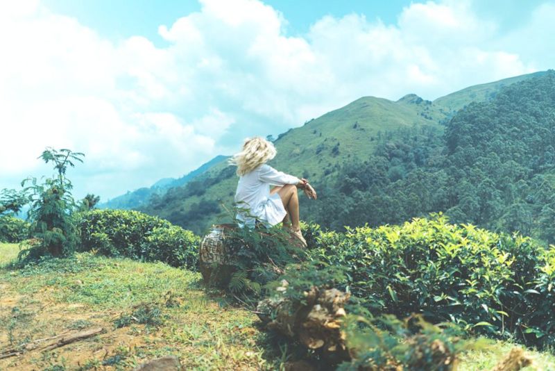 woman and view over hills in Sri Lanka