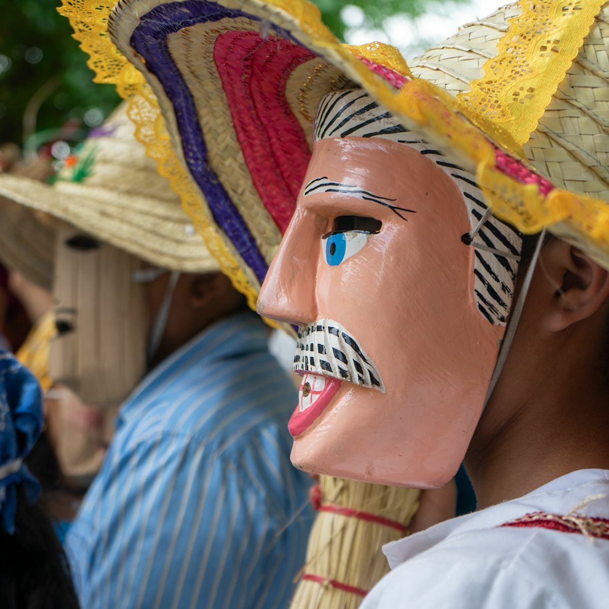 People in masks at traditional festival