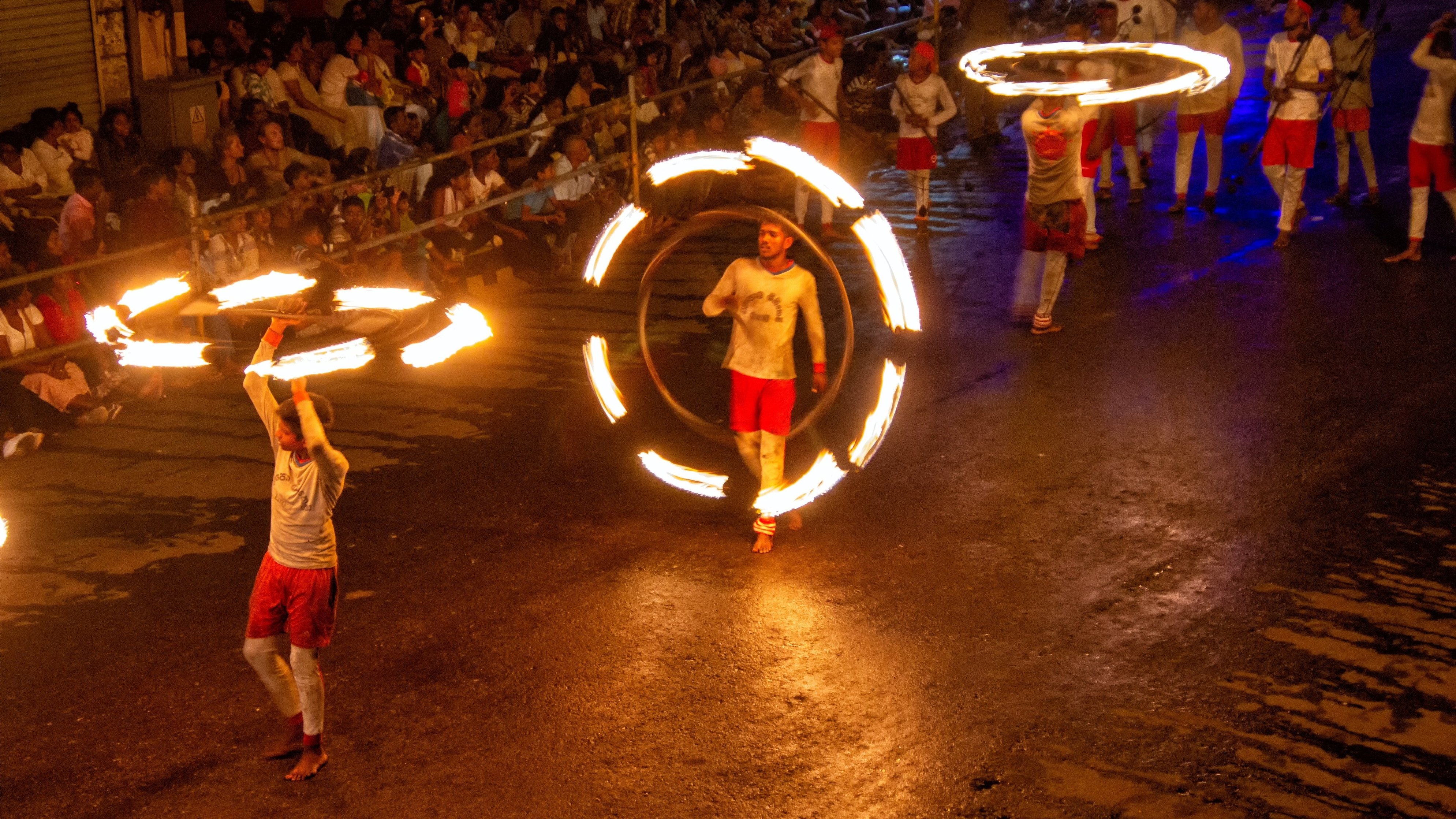 Joel drinking from a coconut in Sri Lanka