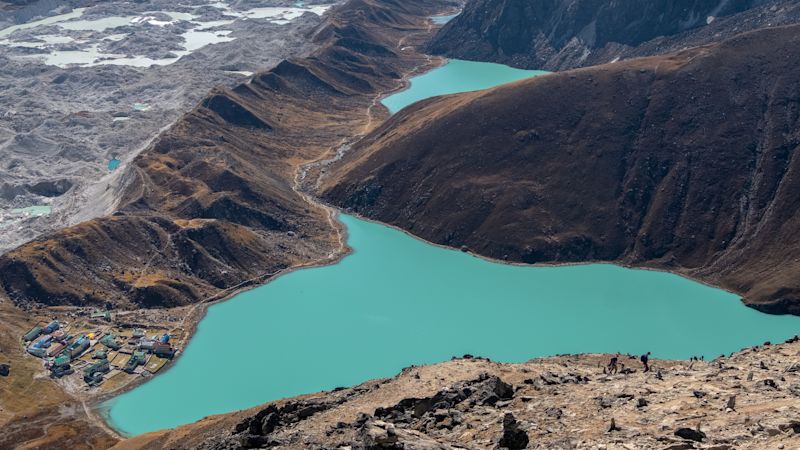 Pur. Panoramic view on Ngozumpa glacier, Gokyo lakes and Gokyo village from summit of Gokyo Ri.