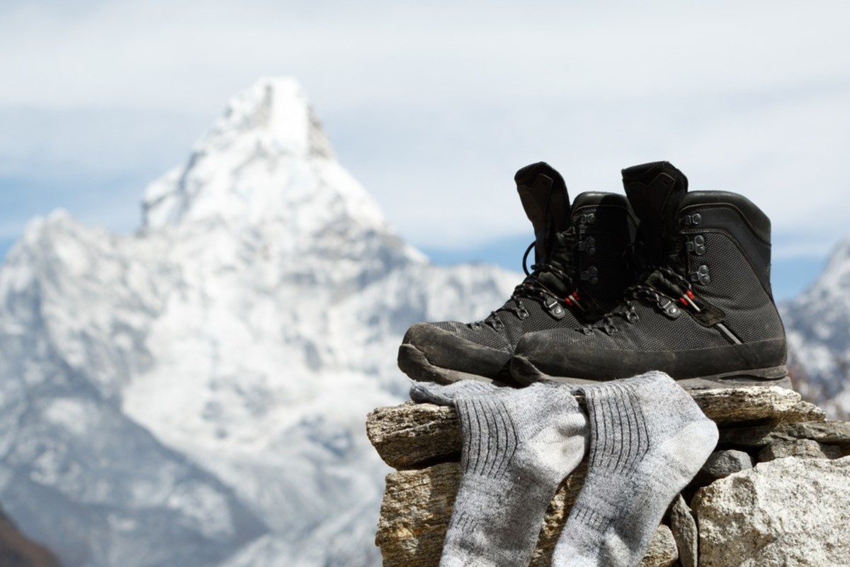 The best hiking boots for trekking in Nepal - Ours. S. Hiking Boots AnD Sock Drying On EBC Trek With Ama Dablam In BackgrounD The best hiking boots for trekking in Nepal - Ours. S. Hiking Boots AnD Sock Drying On EBC Trek With Ama Dablam In BackgrounD