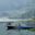 A boat woman taking out her boat in the vast Phewa Lake in August 2014 in Pokhara, Kathmandu, Nepal