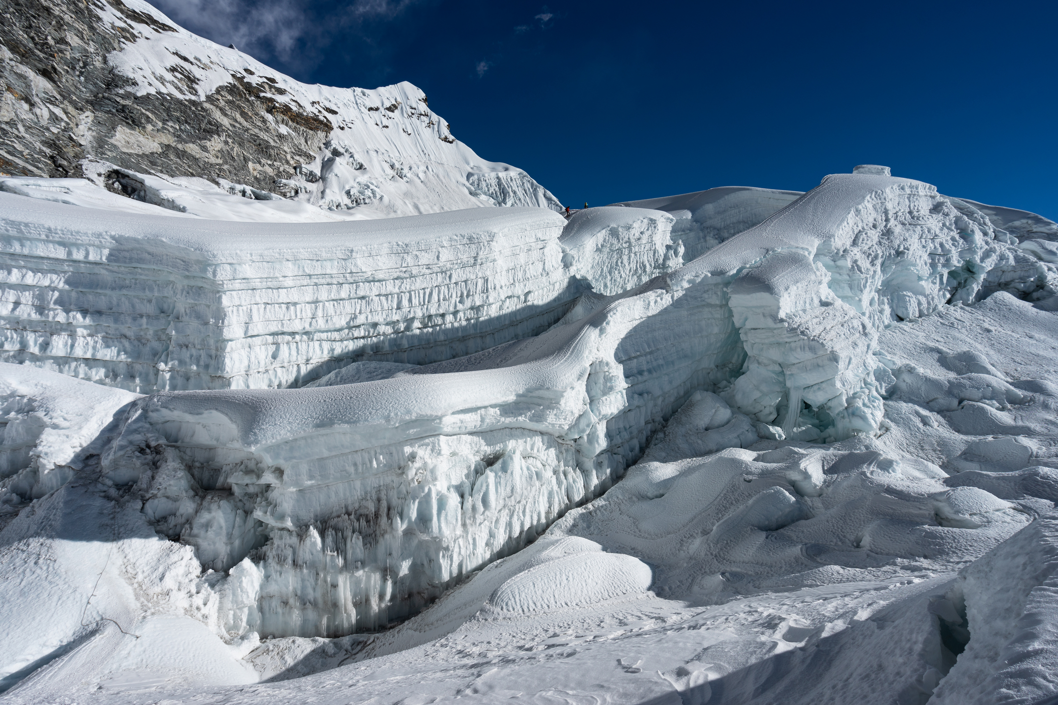 Glacier on top of Island peak with small trail to summit, Himalaya mountains range in Nepal, Asia